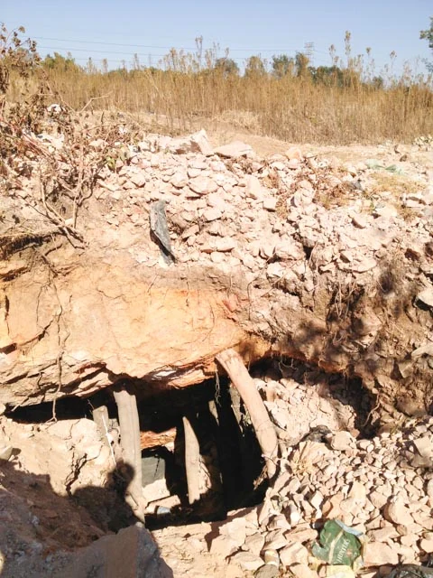 Artisanal gold-mine entrance near Roodepoort, South Africa; reference image, not the Chambero collapse